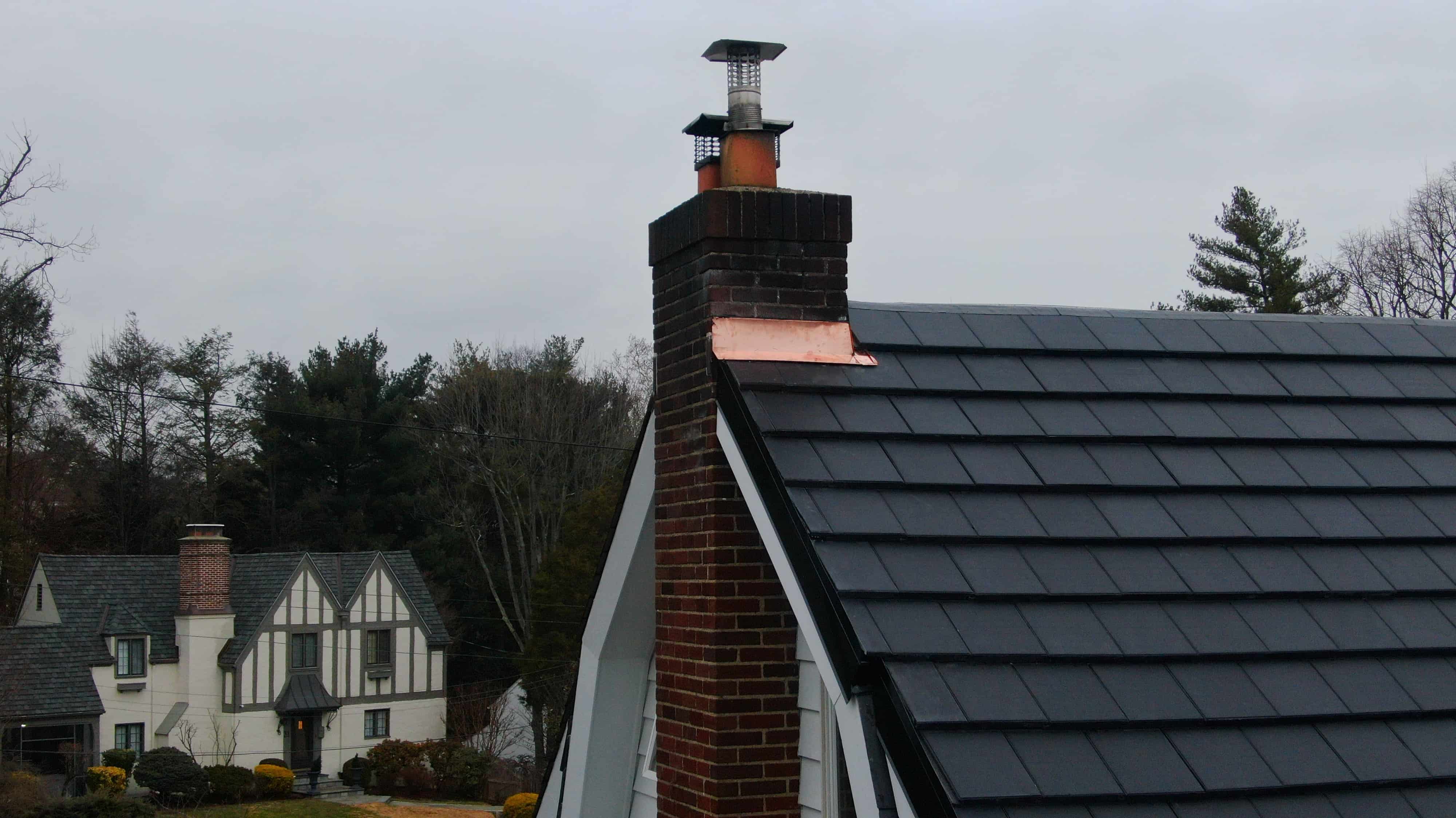 Completed Vitruvion solar roof tile installation showing uniform surface appearance regardless of energy production state
