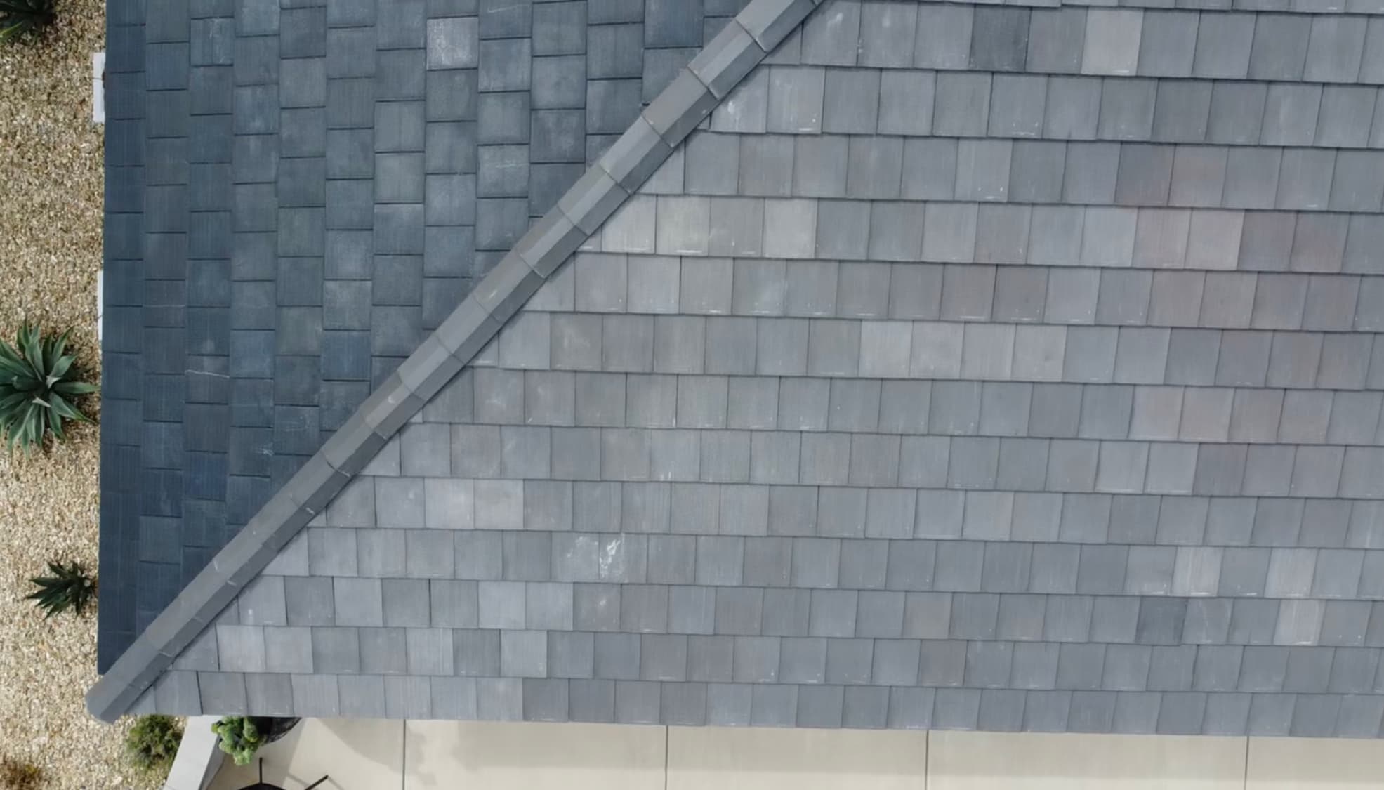 Vitruvion solar roof tile material close up showing integrated photovoltaic cells